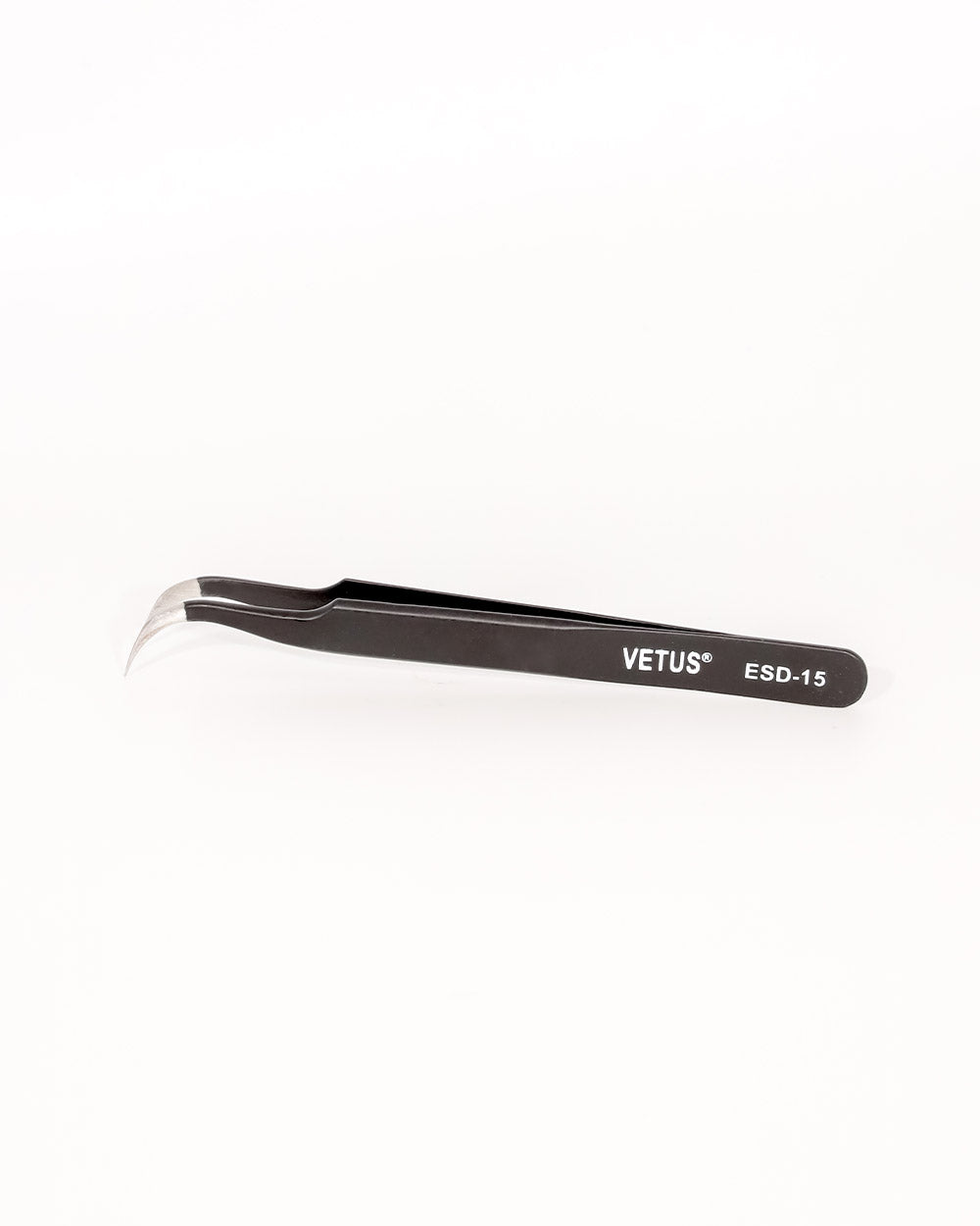 Pair of Vetus tweezers on a white background