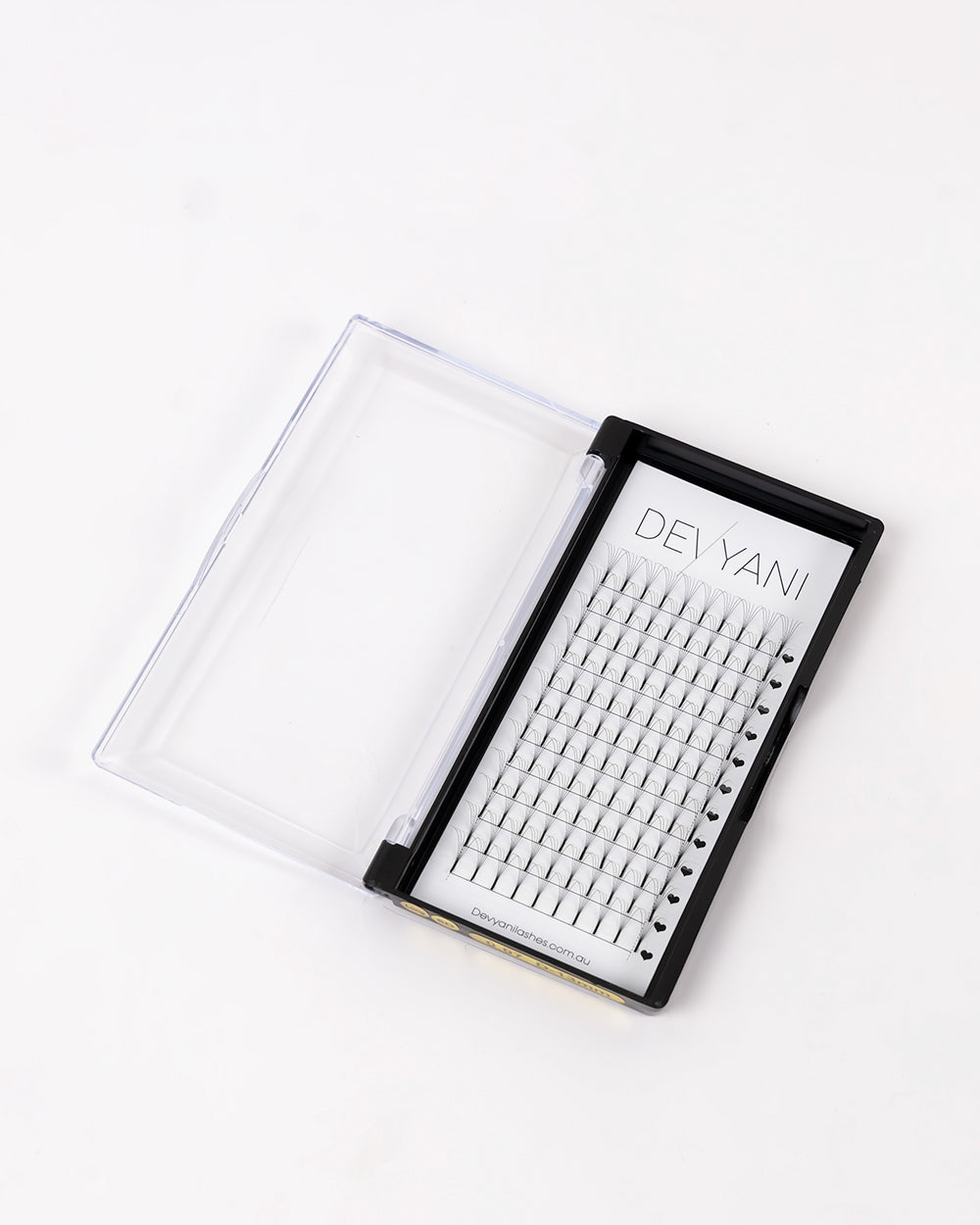 Eyelash extension tray with clear case on a white background