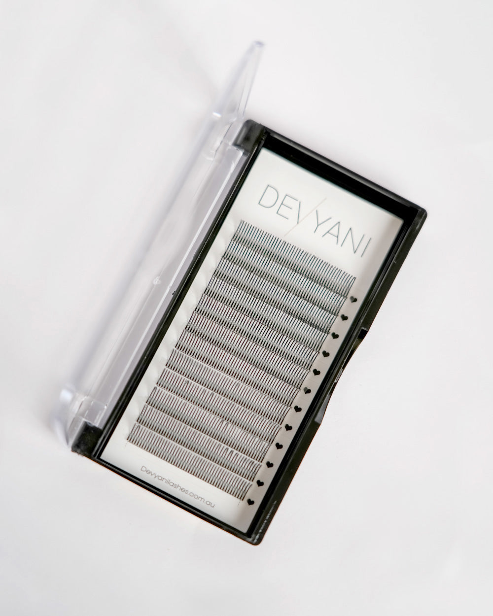Eyelash extension tray with 'DEVYANI' branding on a white background